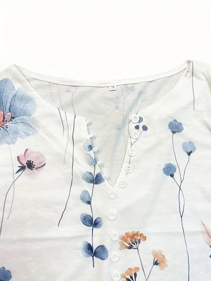 Fiorella – top met bloemenprint, knopen en uitlopende mouwen