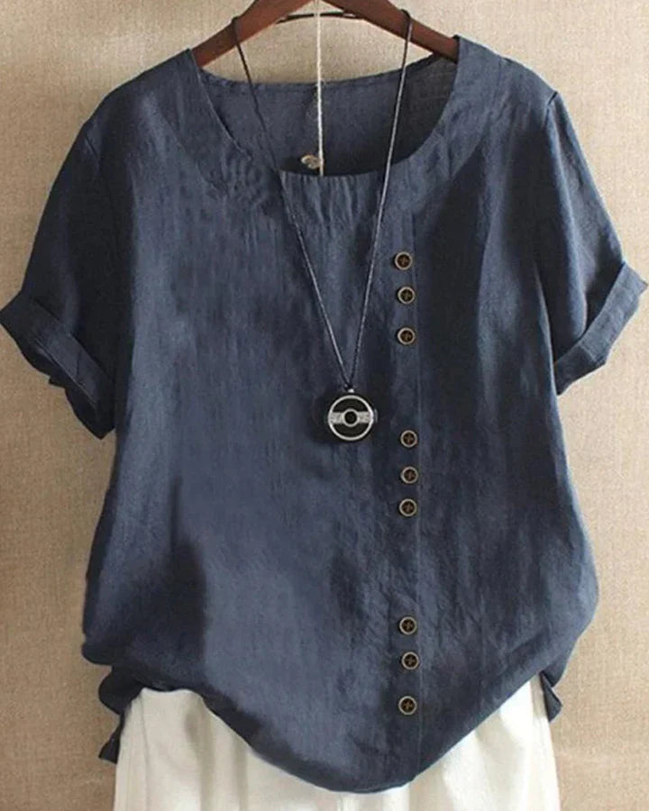 Kelly – effen blouse met korte mouwen en ronde hals