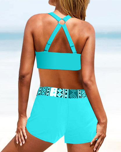 Hoog uitgesneden bikini met geometrisch patroon